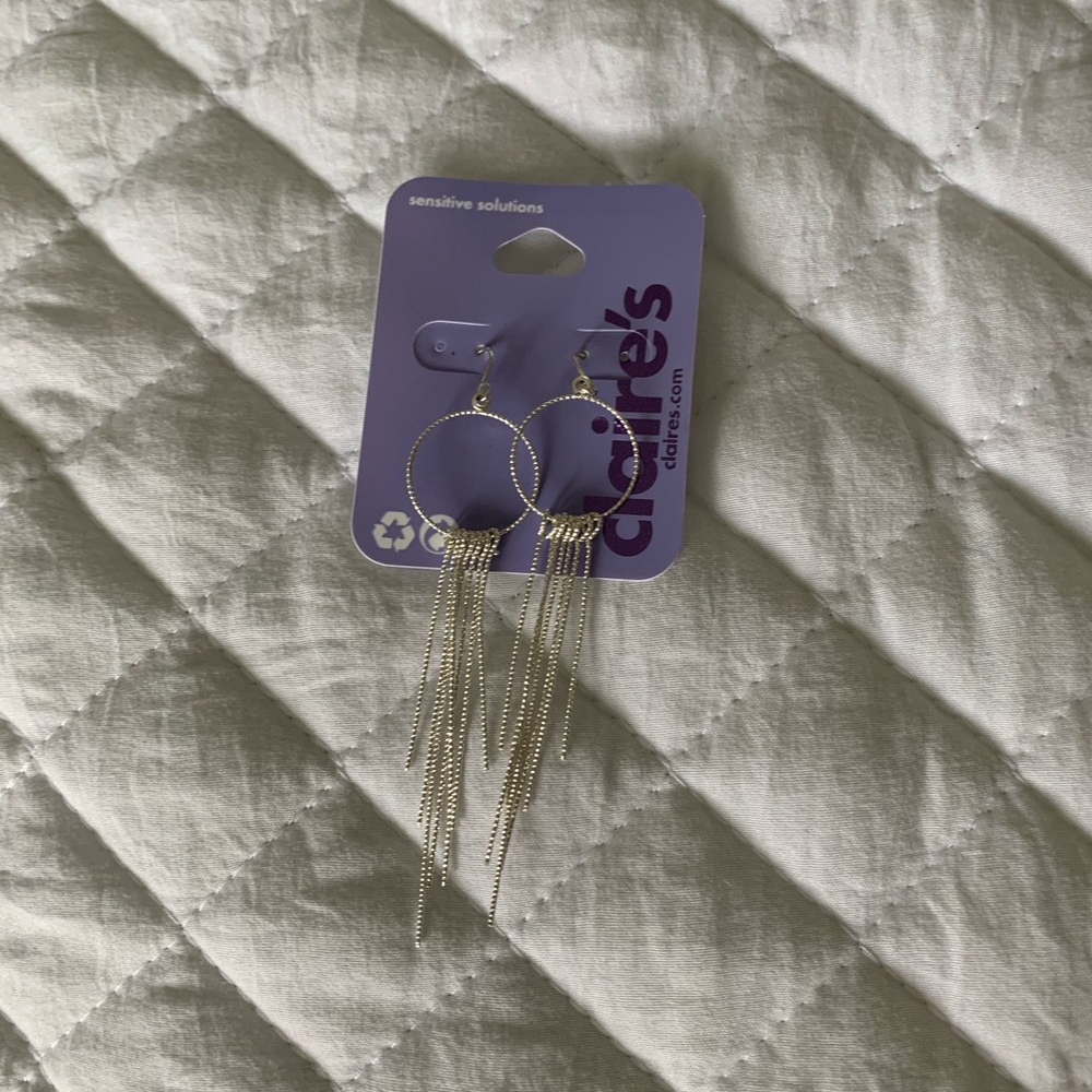 Claire’s earrings — free with purchase
